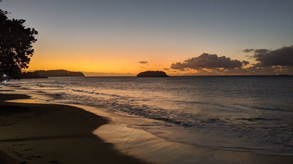 Sunset over a beach at Rodney Bay