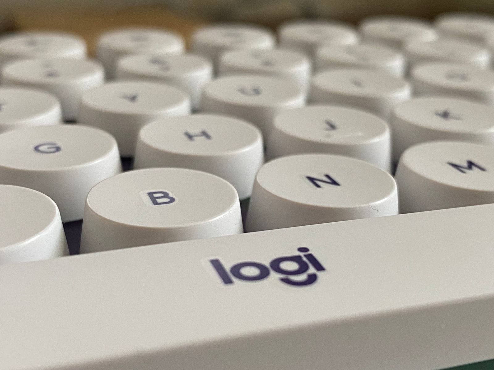 Logitech POP Keys buttons with a focus on the centre of the keyboard