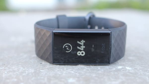 Fitbit Charge 3 on a wall